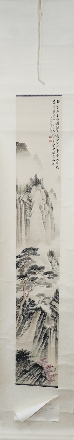 Manner of Huang Junbi, 20th/21st century, a set of four scroll paintings on paper of mountainous landscapes, boxed. Condition - fair to good